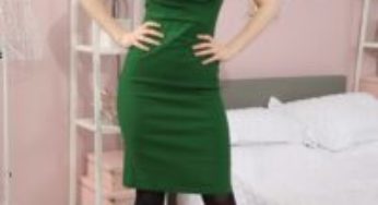 Layered-Nylons Aurora Phoenix in a green minidress and high heels