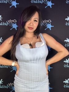 OnlyFans Star Emily Mai Milks MILF Duties at SEXPO Melbourne: “You Never Stop Being a Mum”