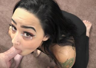 Busty babe Indigo sucks dick in her catsuit